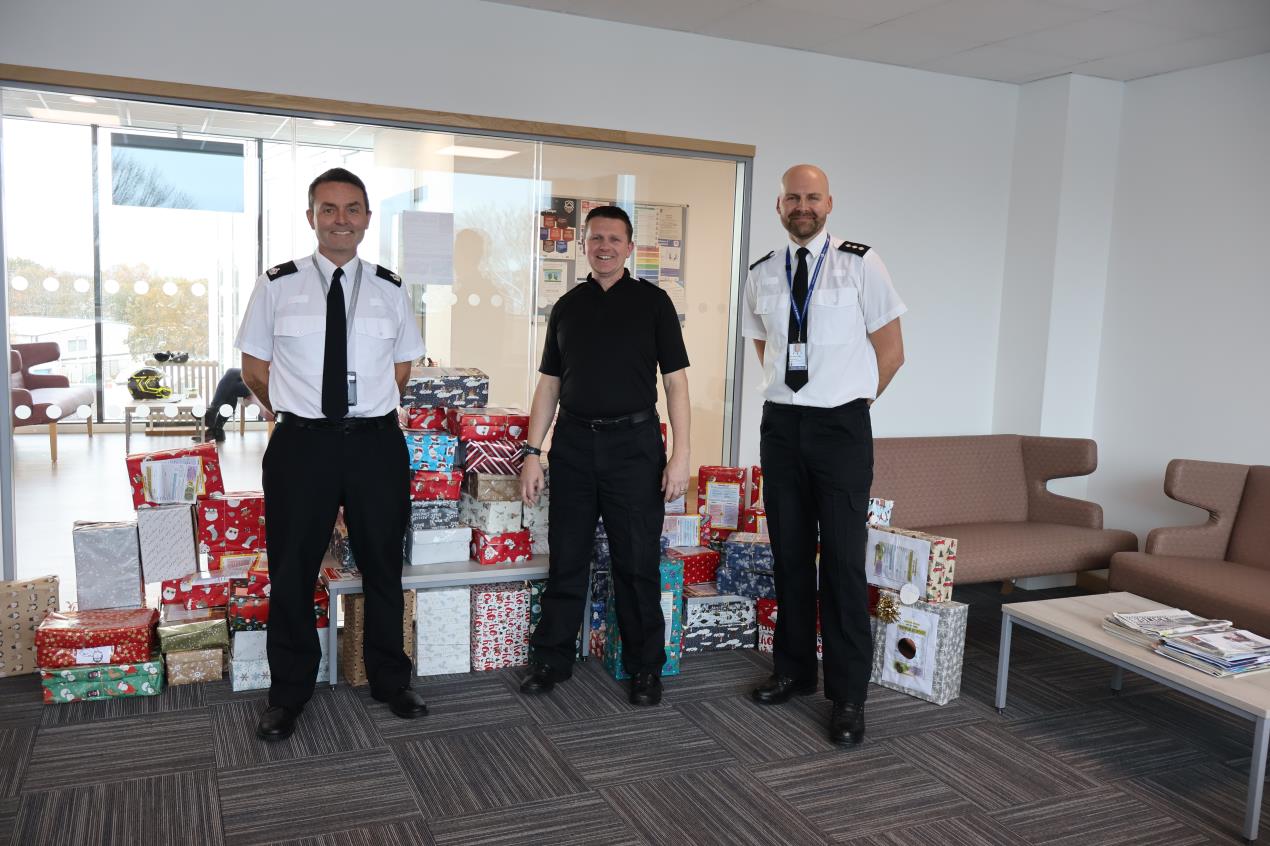 officers with boxes.jpg