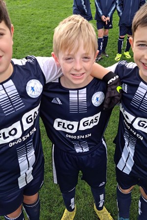 Biscovery Youth FC under 12s, three players in kit .jpg