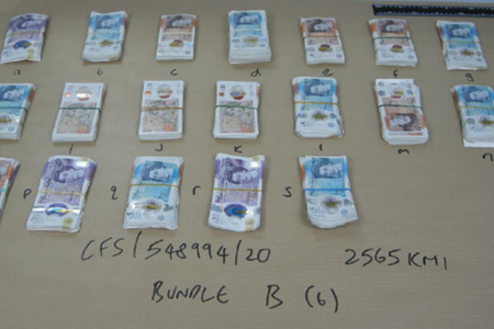 0007.24 Cash seized in the operation2.jpg