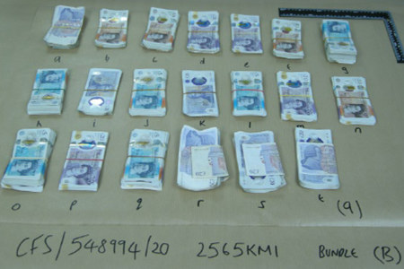0007.24 Cash seized in the operation3.jpg