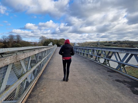 Hoody person crossing bridge.jpg