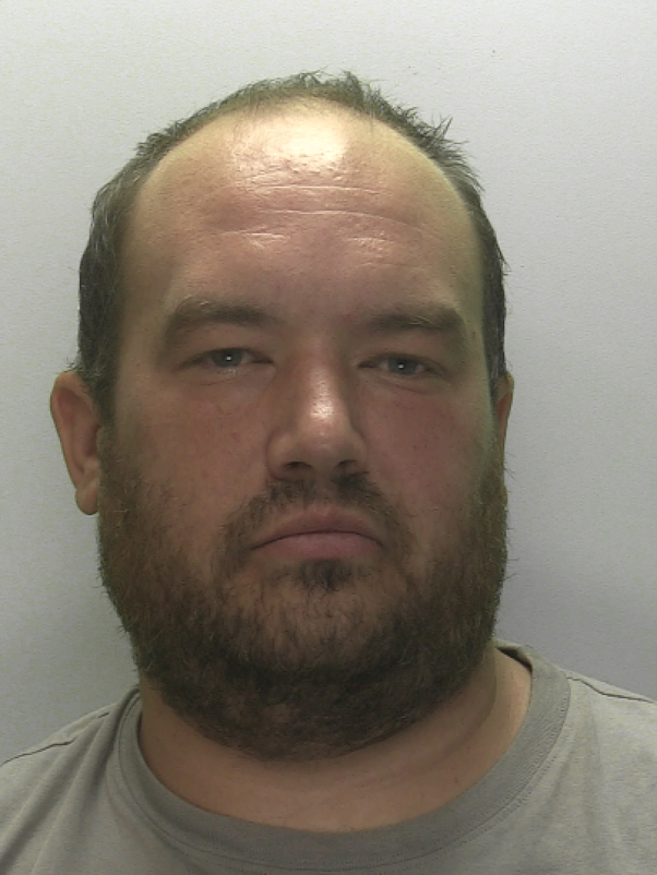 Scott COOMBES custody photo.jpg