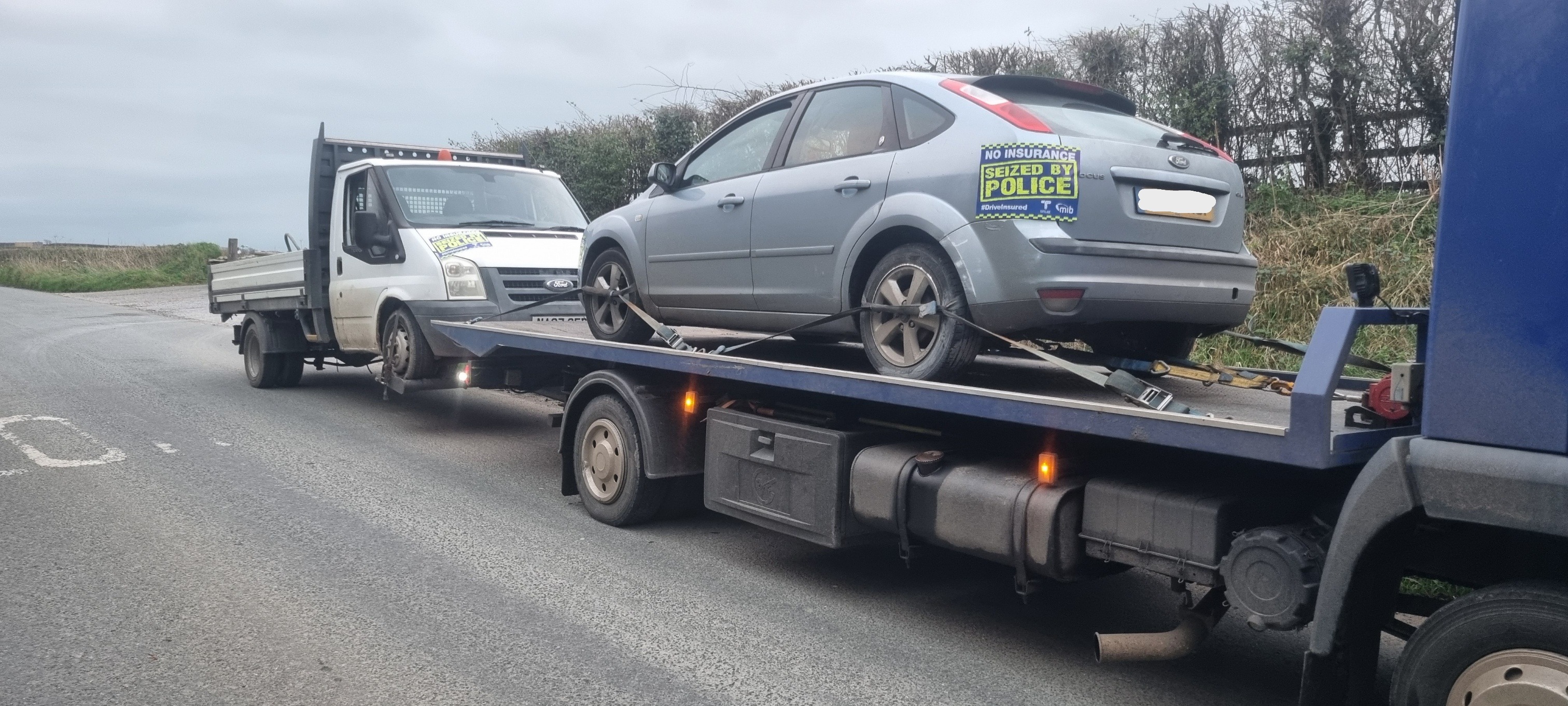ODI Seized car and lorry.jpg